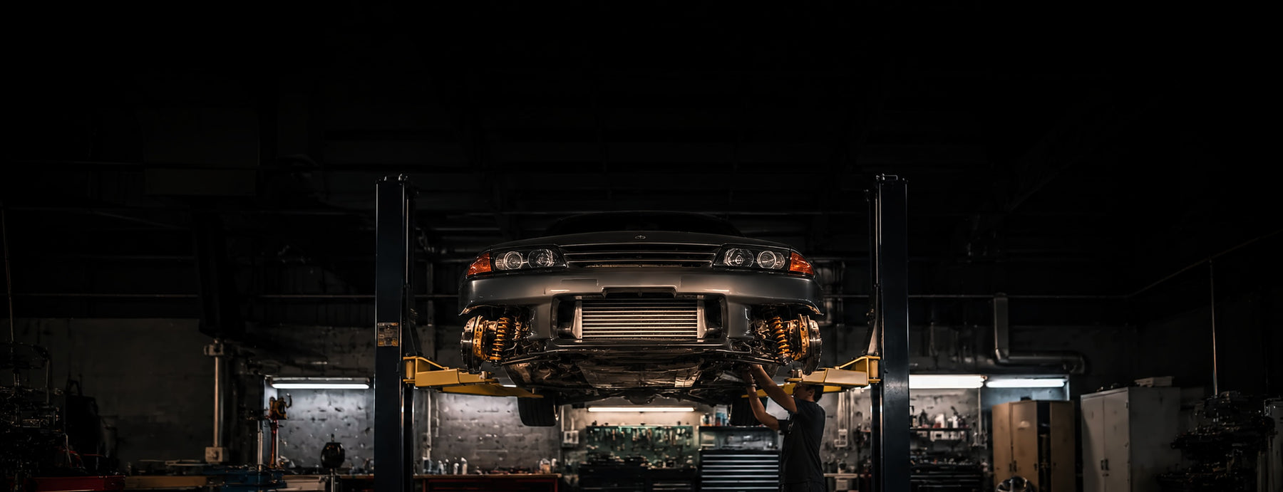 Coilover and suspension install on liftslide-4-coilovers
